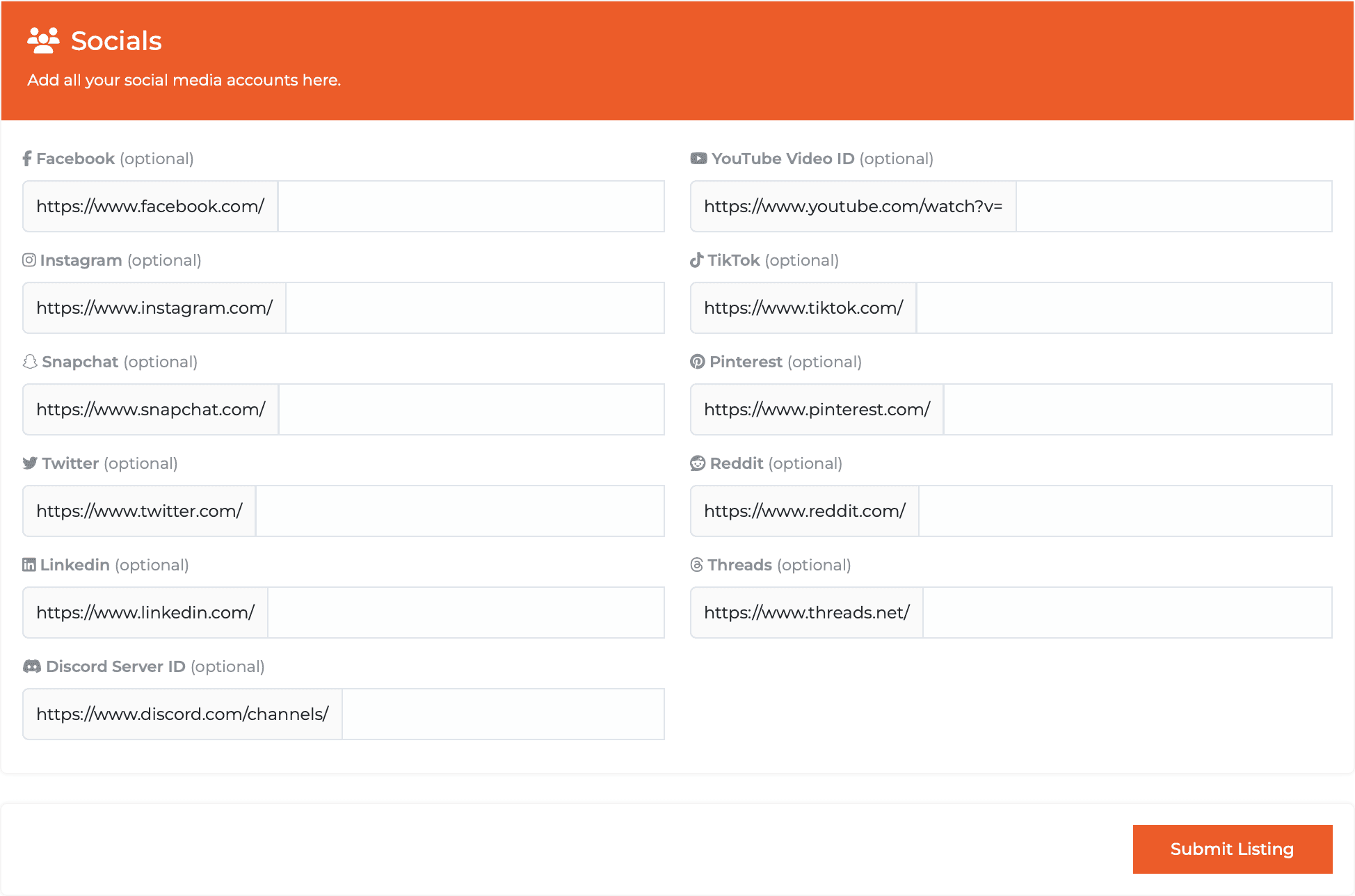 SaaS Radius Socials card, subtitled “Add all your social media accounts here.”: eleven optional fields with grey address prefixes for Facebook, YouTube Video ID, Instagram, TikTok, Snapchat, Pinterest, Twitter, Reddit, LinkedIn, Threads and Discord Server ID, then the orange Submit Listing button
